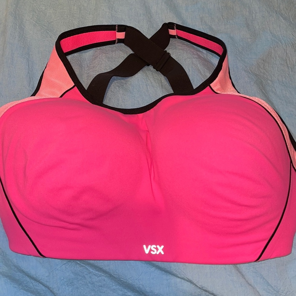 Victoria Secret sports bra. Hot pink with racer back straps. Rarely worn.